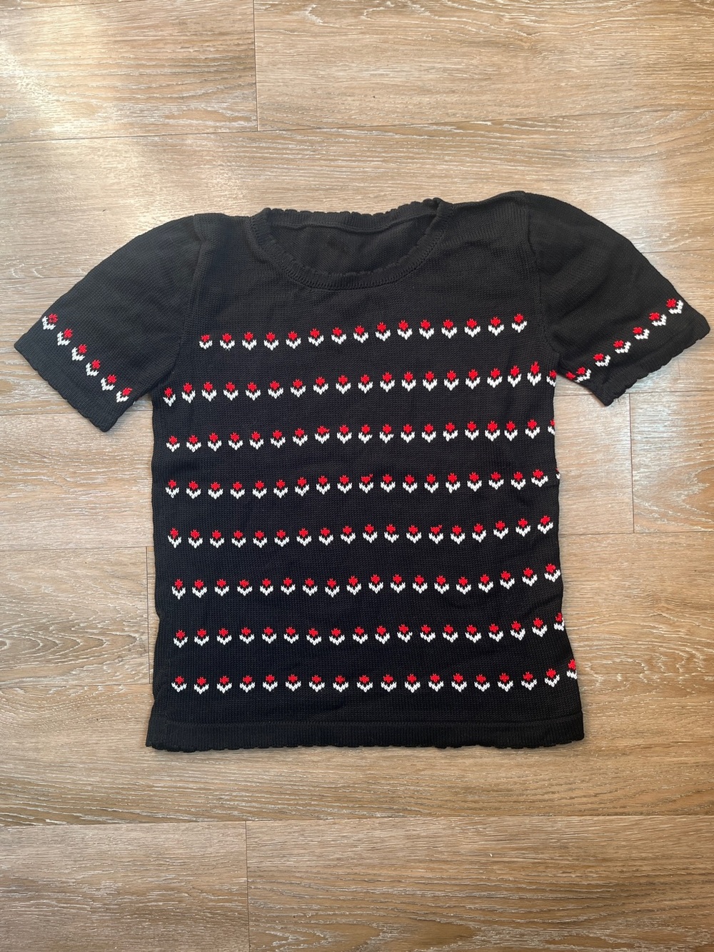 Vintage Black Short-Sleeve Knit Top with floral design